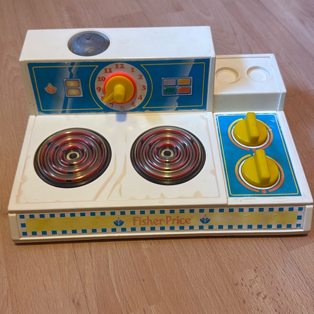 Vintage Fisher-Price stove all working knobs